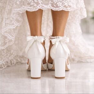 Chic White Heels with Bow Accent